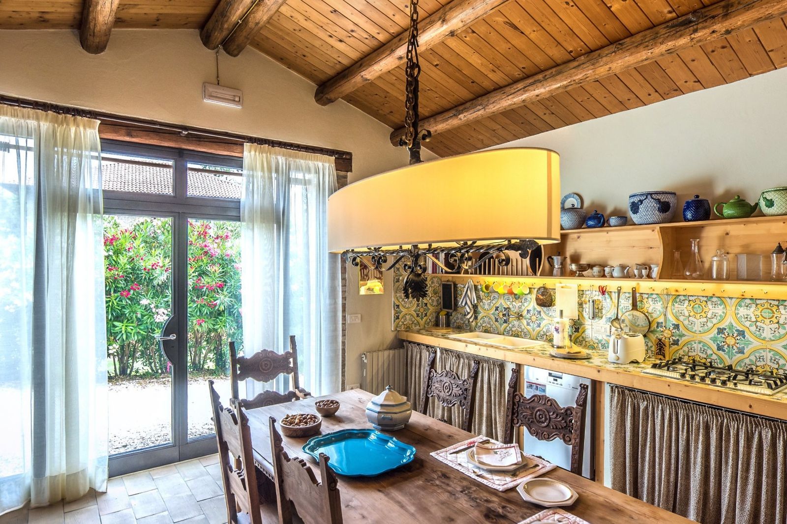 The Loft kitchen with a long wooden table